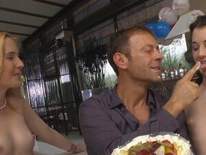 Spread frosting on their natural bodies and lick it off. A wild threesome ensueswith blonde Lolly and dark haired Alice slathering Roccos huge prick in sticky confection ... but eating more cock than cake. They mash their feet in frosting and dick.